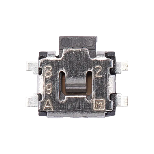 Small black and silver PS4 power and eject tactile switch shown from three angles, with metal mounting tabs and electrical contacts - THARAA STORE