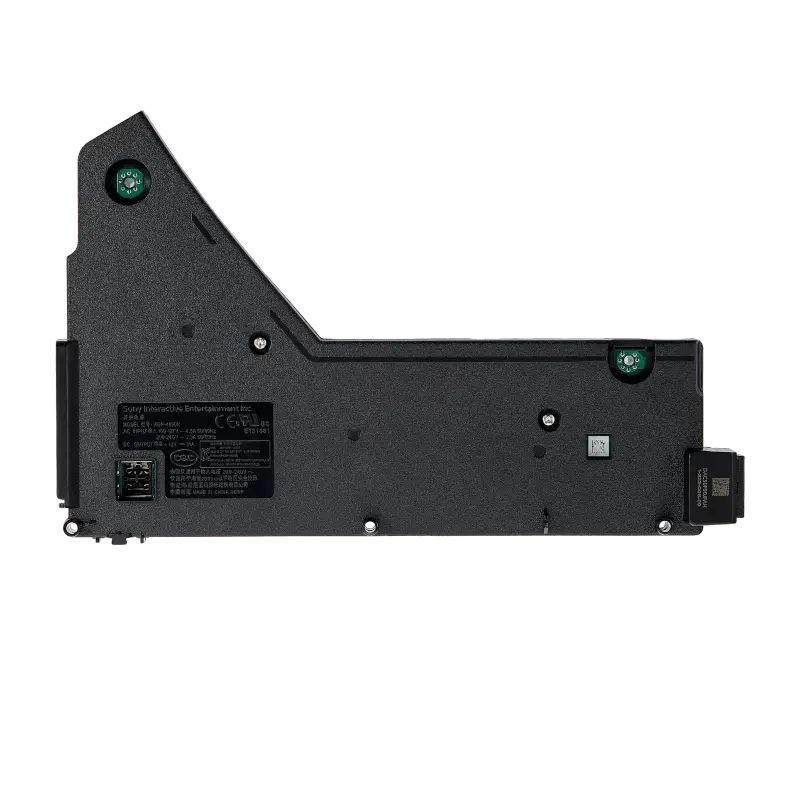 Black internal PS5 power supply unit for compatible CFI-10XX and CFI-11XX consoles, shown from multiple angles with its specification label, ventilation openings, mounting points and AC power connector - THARAA STORE