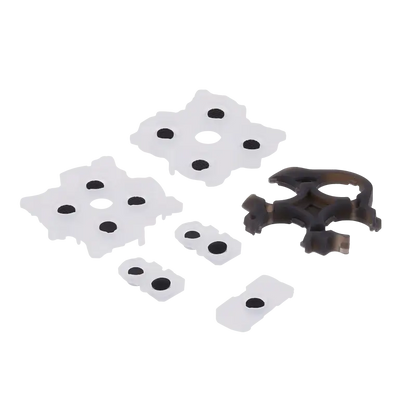 PS5 DualSense Version 2 replacement conductive rubber membranes with dark contact areas and a dark internal support component, shown from multiple angles - THARAA STORE