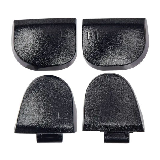 Four black PS5 DualSense replacement buttons labelled L1, R1, L2 and R2, shown from the front and rear with their mounting structures visible - THARAA STORE