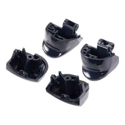 Four black PS5 DualSense replacement buttons labelled L1, R1, L2 and R2, shown from the front and rear with their mounting structures visible - THARAA STORE