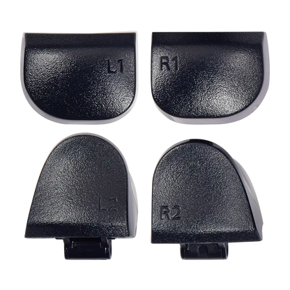  Four black PS5 DualSense replacement trigger buttons labelled L1, R1, L2 and R2, shown from the front and rear with their mounting structures visibl - THARAA STORE