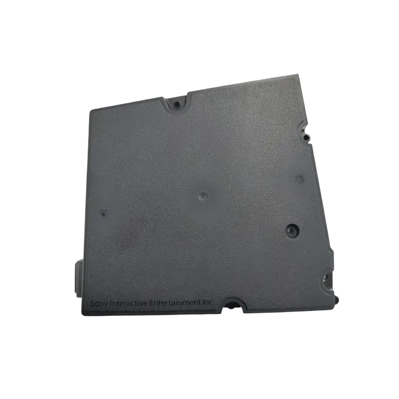 Black ADP-400JR internal power supply for a compatible PS5 Slim console, shown from multiple angles with ventilation holes, mounting points, and AC power inlet - THARAA STORE