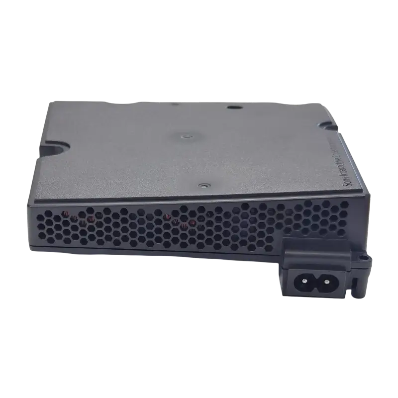 Black ADP-400JR internal power supply for a compatible PS5 Slim console, shown from multiple angles with ventilation holes, mounting points, and AC power inlet - THARAA STORE