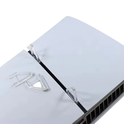 Pair of transparent triangular horizontal support feet with gray contact pads for a PS5 Slim console - THARAA STORE