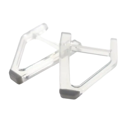Pair of transparent triangular horizontal support feet with gray contact pads for a PS5 Slim console - THARAA STORE