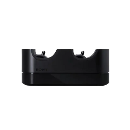 Black Sony DUALSHOCK 4 charging station for PS4, shown beside its PS4-branded retail box - THARAA STORE